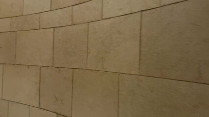 Nazareth, Israel, November 18, 2025 — Stone steps leading to the second floor and stained glass windows of the Church of the Annunciation, site where Gabriel announced Jesus’ birth.