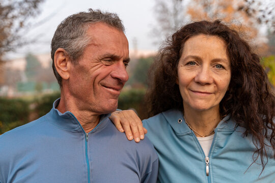 Spouses showing togetherness and connection outdoors, enjoying active lifestyle