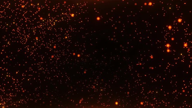 Abstract rising glowing orange fire particles and sparks on black background. Floating bokeh embers, magical golden dust, or heat visual effect loop.