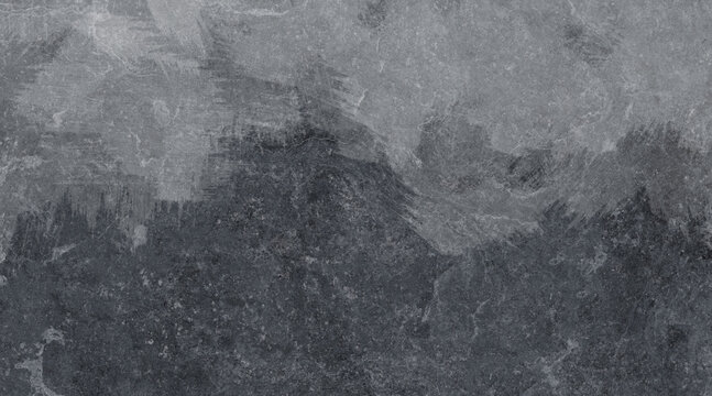 Dark grey stone surface with rough textured patterns creating a natural abstract rock background.