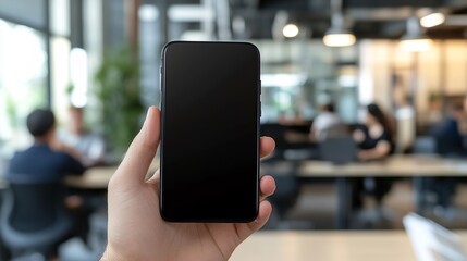 Showcase your mobile app on a smartphone held up in a modern workspace for a professional tech product demo or mobile application advertisement