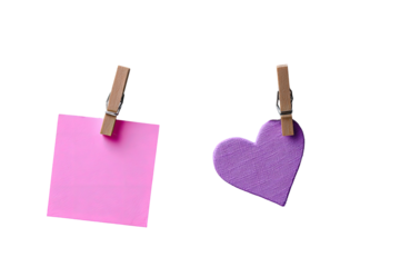 Two colorful notes, one square, one heart-shaped, pinned with wooden clothespins