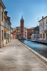 Walking among the picturesque canals of Comacchio, Italy