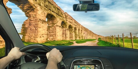 Driving past the ancient Roman Aqueduct Park in Italy