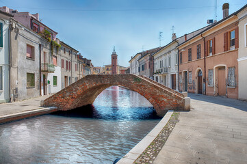 Walking among the picturesque canals of Comacchio, Italy