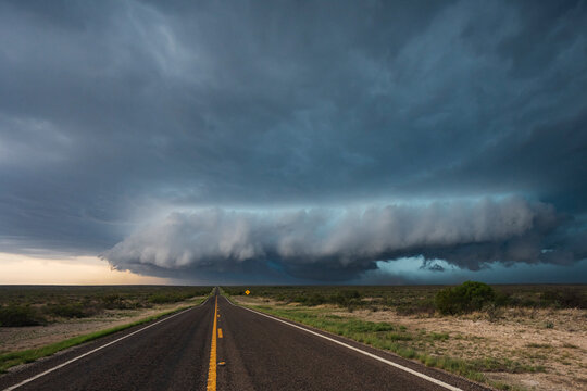 Tracking a Supercell alomg Texas Highway 285, cloud formations hovering over the land. 