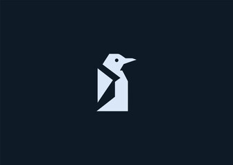 A simple minimalist penguin logo designed with smooth rounded lines and a clean silhouette, representing friendliness, calmness, and charm in a modern creative vector illustration