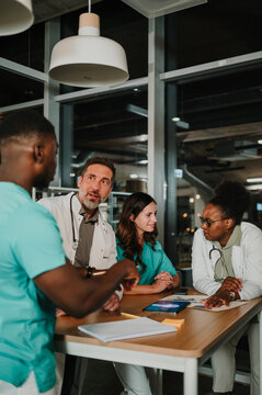 Medical team collaborating during a hospital meeting