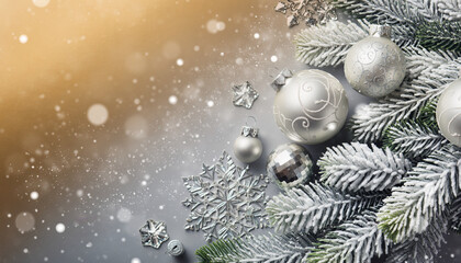 Elegant Christmas tree branch with silver ornaments and bokeh lights.