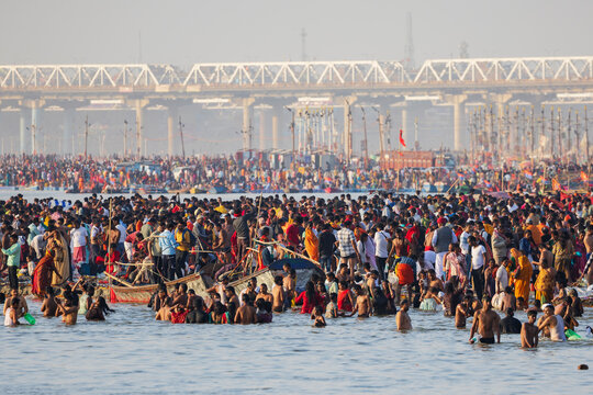 Crowds Come to the river Ganges to Bathe during the Kumbh Mela