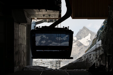 Glacial Paradise cable car in Zermatt, with the Swiss Alps stretching into the background under a clear alpine sky in the border of Italy and Switzerland