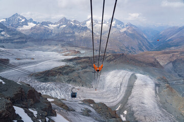 Glacial Paradise cable car in Zermatt, with the Swiss Alps stretching into the background under a clear alpine sky