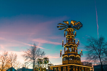 Colorful Christmas Festival Float With Illuminated Decorations, Stars, And Windmill Top