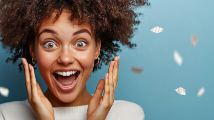 Happy young woman celebrating victory after winning the lottery, joyful emotional winner, success and achievement concept, copy space