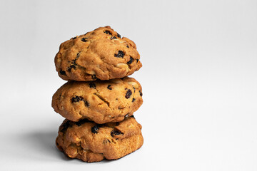 Cookies with raisins and nuts on white background. Photo fresh baked goods. For bakery recipe, food post, article.