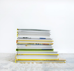 Stack of colorful fairy tale books for kids on a soft, light background