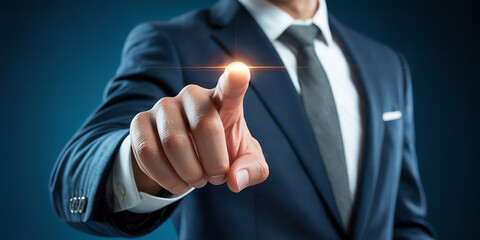 Businessman in dark suit touching glowing point with index finger pointing