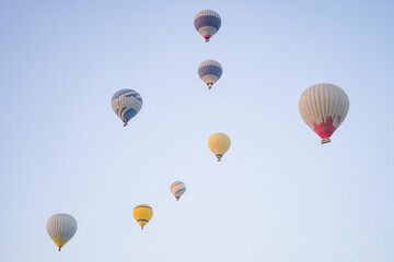 Hot Air Balloons over Cappadocia Valleys in Nevsehir, Turkiye