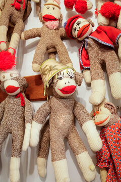Las Vegas, New Mexico, United States. Antique store showcasing a wall of vintage sock monkey toys. 