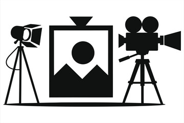 Obraz premium Silhouette Icons of Photography and Videography Equipment: Spotlight on Tripod, Image Frame with Mountain Placeholder, Vintage Movie Camera on Stand - Black Vector Illustration for Media Production