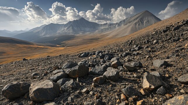 Rugged landscape of scattered boulders near distant mountains - Powered by Adobe