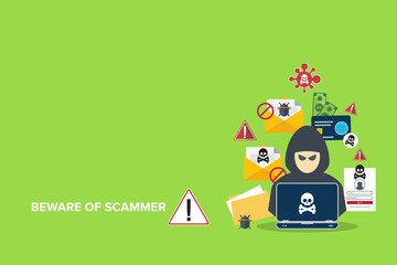 Hacker, scammer in front of his computer committing digital cybercrime.