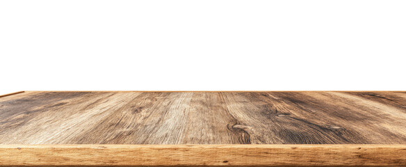 Fototapeta premium Close-up of a wooden table top against a black background. The table has a light brown/tan wood grain pattern and a light brown/tan edge