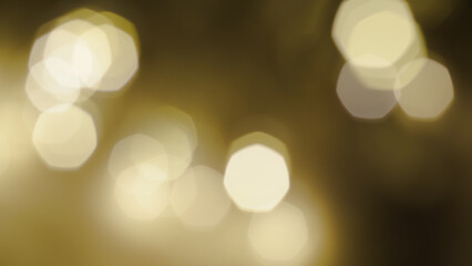Soft shimmering golden shapes create a warm atmospheric Christmas light scene.