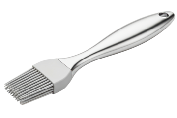 Silicone pastry brush with a modern stainless steel handle isolated on transparent background