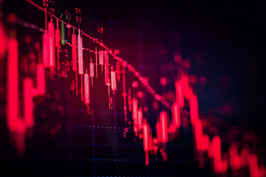 The red crashing market volatility of crypto trading with technical graph and indicator, red candlesticks going down without resistance, market fear and downtrend. Cryptocurrency background concept.