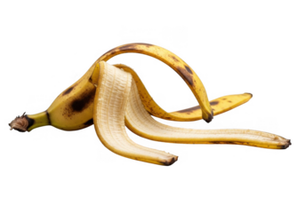 A banana peel isolated on transparent background, discarded after enjoying the fruit, representing food waste, recycling, and the cycle of consumption