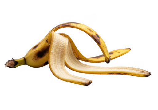 A banana peel isolated on transparent background, discarded after enjoying the fruit, representing food waste, recycling, and the cycle of consumption