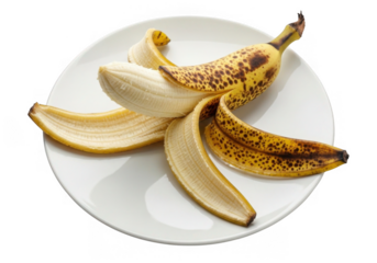 Partially peeled ripe banana on a white plate isolated on transparent background, revealing its creamy flesh and speckled peel, a delicious and nutritious snack