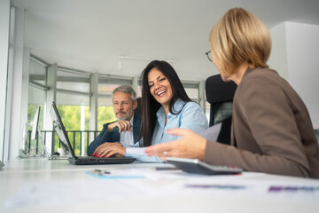 Fototapeta premium Business people negotiating at boardroom behind closed doors