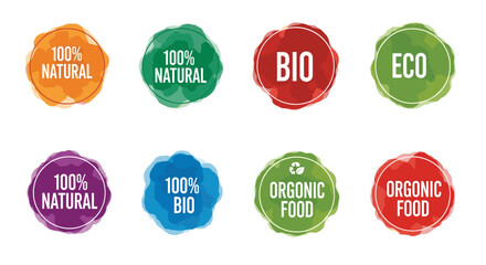 Collection of eight organic and natural food labels with varied colors and certifications.