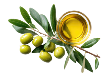 Fresh olives and olive oil in a small bowl, vibrant green leaves and branches
