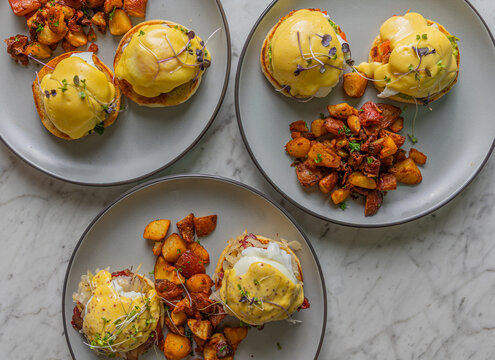 eggs benny variety on plates