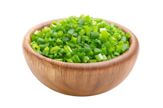 Freshly chopped green onions in a wooden bowl isolated on a transparent background
