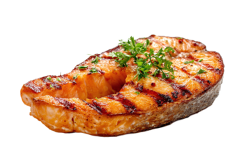 Grilled salmon steak isolated on transparent background, garnished with fresh parsley