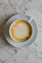 overhead latte on marble table