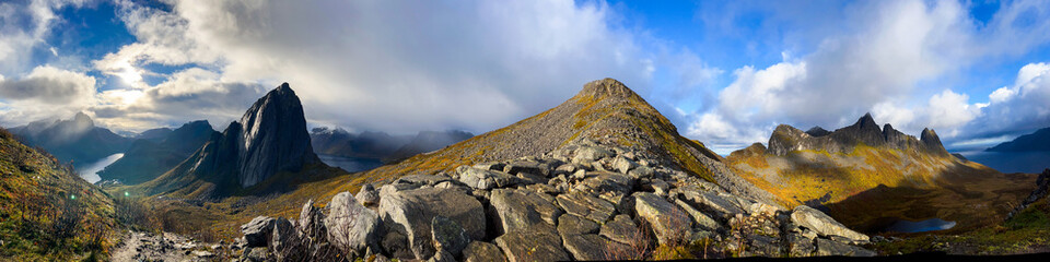 Stunning autumn landscape of Segla Mountain in Senja Island, Northern Norway, with dramatic cliffs and fjords.