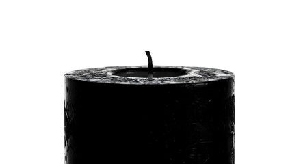 Closeup of a black pillar candle with a short, burnt wick isolated on transparent background, creating a simple yet striking image