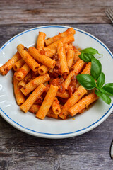  Pasta bolognese .Italian home made meal Fresh   maccheroni pasta with tomato sauce, basil, herbs ,parmesan cheese ,fresh cherry tomatoes and parsley on wooden background. Kitchen Poster 