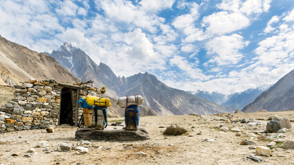 Porters' bags on the trekking trail from Jula to Payu, K2 Base Camp trek, Pakistan