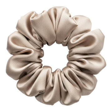 Beige silk scrunchie isolated on transparent background, a hair accessory