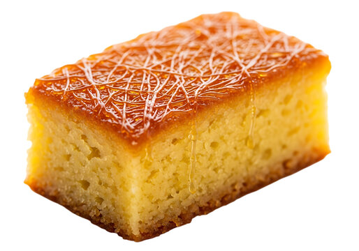 Delicious golden yellow cake slice with white icing drizzle isolated on transparent background
