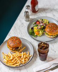 bacon cheeseburger on sesame seed bun in diner hard light