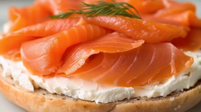 Bagel lox cream cheese sandwich with fresh dill and sliced salmon for breakfast, savory closeup comfort food, vibrant brunch gourmet