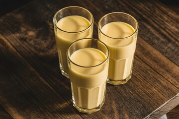 Delicious mango lassi recipe: healthy indian yogurt drink in tall glasses