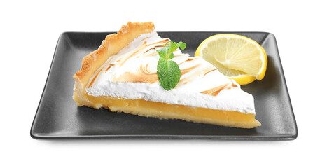 Slice of tasty lemon meringue tart with mint isolated on white